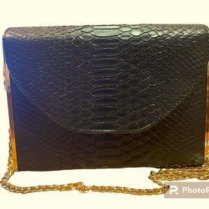 Madison West black evening lizard like clutch chain leather strap